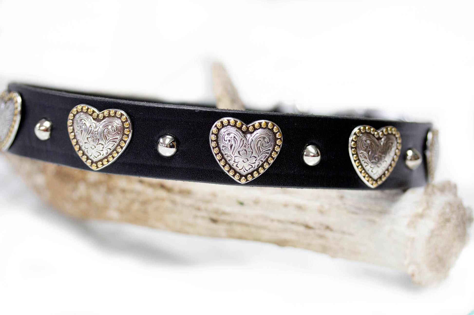 1 inch Latigo Leather with scrolled hearts and silver cone studs